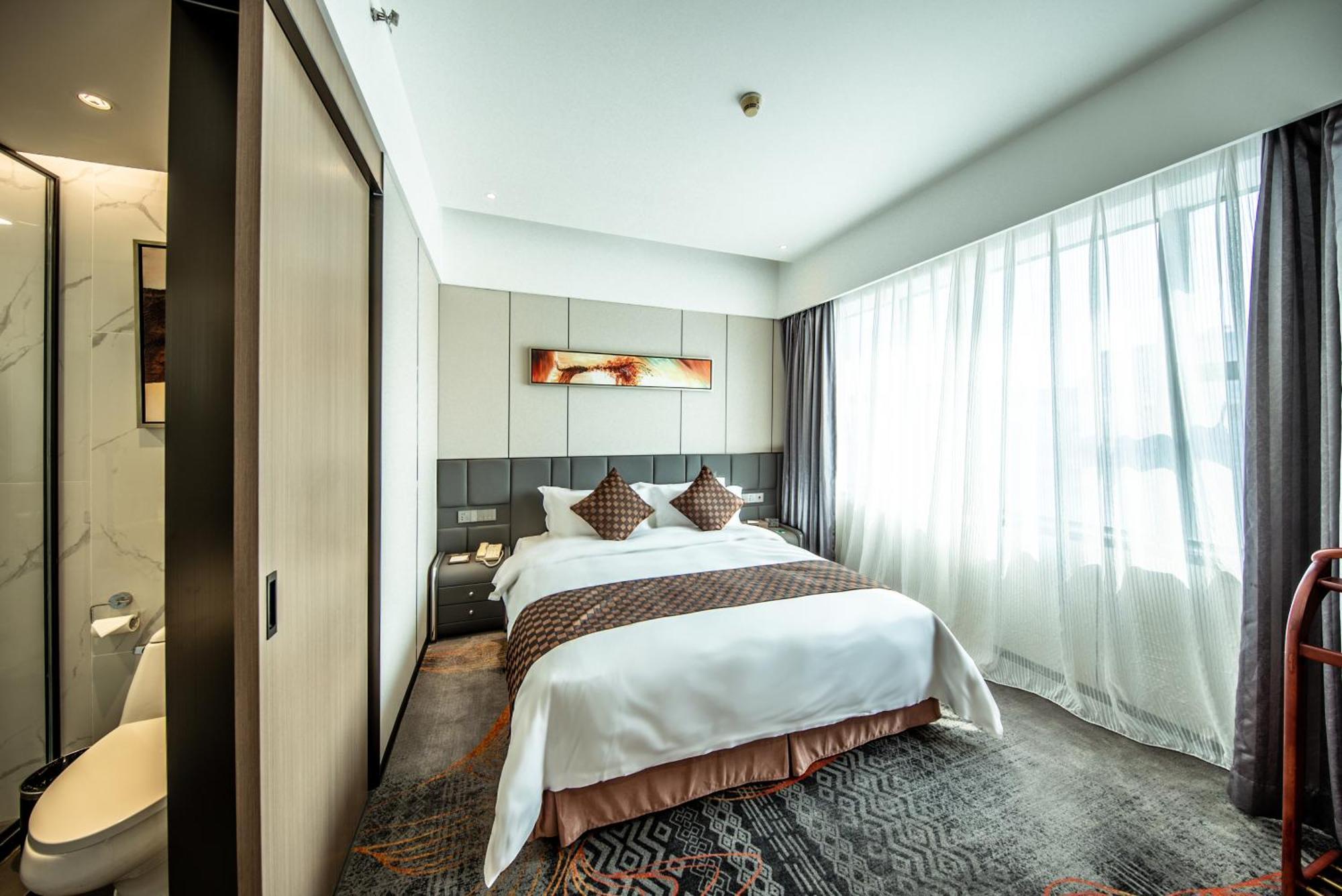 Romanjoy International Hotel Shenzhen Bagian luar foto